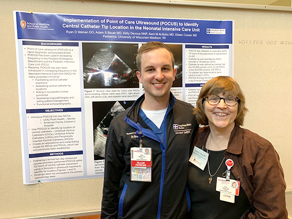 Neonatology and Newborn Nursery fellow Ryan Meinen, DO, is joined by Neonatology and Newborn Nursery faculty member Pamela Kling, MD, by his poster on the use of point-of-care ultrasound in the neonatal intensive care unit.