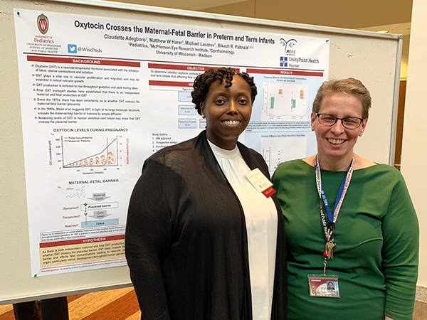 Neonatology and Newborn Nursery fellow Claudette Adegboro, MD, shares her poster on how oxytocin crosses the maternal-fetal barrier in preterm and term infants with Neonatology and Newborn Nursery distinguished scientist Christine Sorenson, PhD.