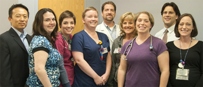 The pediatric emergency medicine team, from left: Michael Kim, MD; child life specialist Regina Yocum; pediatric ED nurses Leah Kechele and Monica Cain; Joshua Ross, MD; pediatric ED care coordinator Mary Jean Erschen-Cooke; pediatric ED nurse Pam Van Mol; Gregory Rebella, MD; and child life specialist Amanda Roudebush.