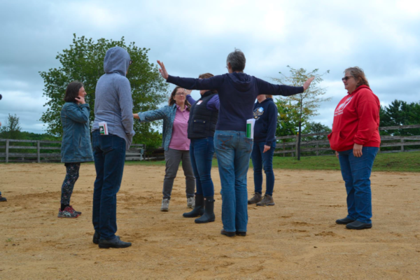 group of people standing in a circle