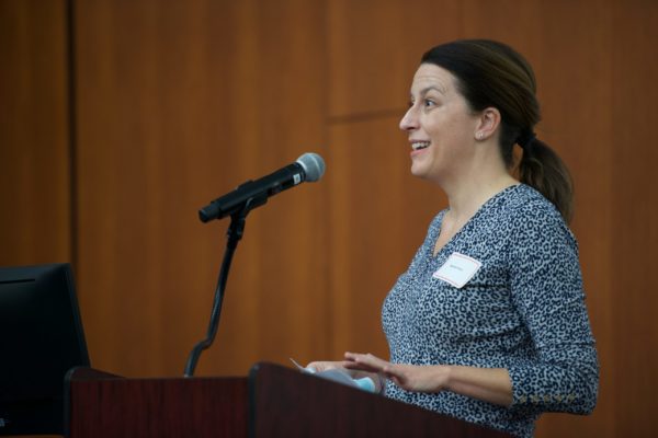 Dr. Michelle Kelly at microphone