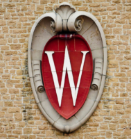 A W crest emblem is seen on the Field House from inside of Camp Randall Stadium at the University of Wisconsin-Madison