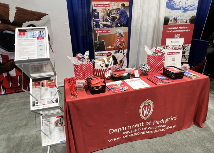 a conference booth for the University of Wisconsin Department of Pediatrics