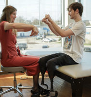 Deanna Jewell with a patient in the Limb Difference Clinic
