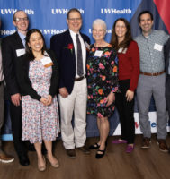 Department of Pediatrics colleagues with two physician excellence award winners.