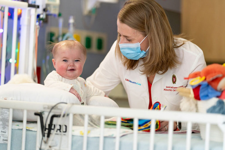Child and NP in pediatric ICU.