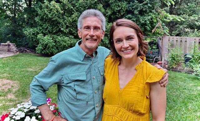 Dr. David Allen and Dr. Victoria Nicksic standing in a backyard garden.